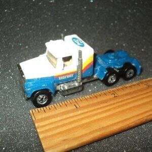 Hot Wheels 1981 Ford LTL Semi Truck Cab Hauler Bigfoot Champion Monster Rigs
